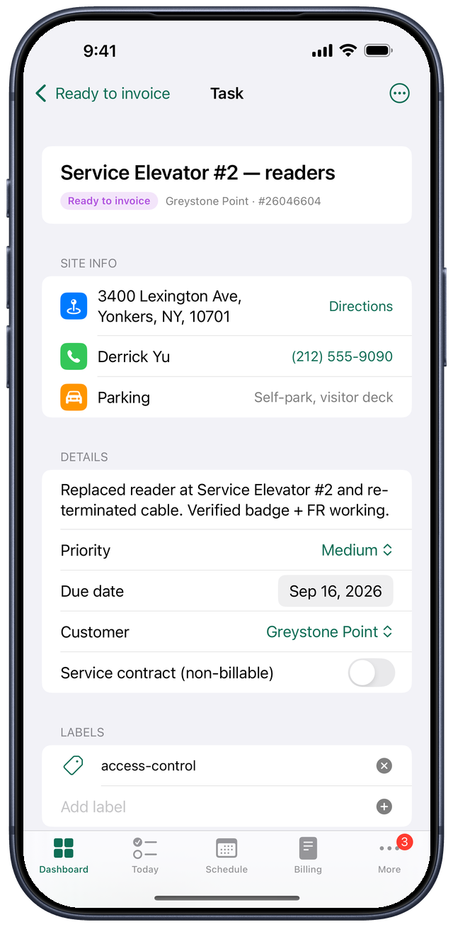 Job detail on iPhone — site address, on-site contact and parking notes